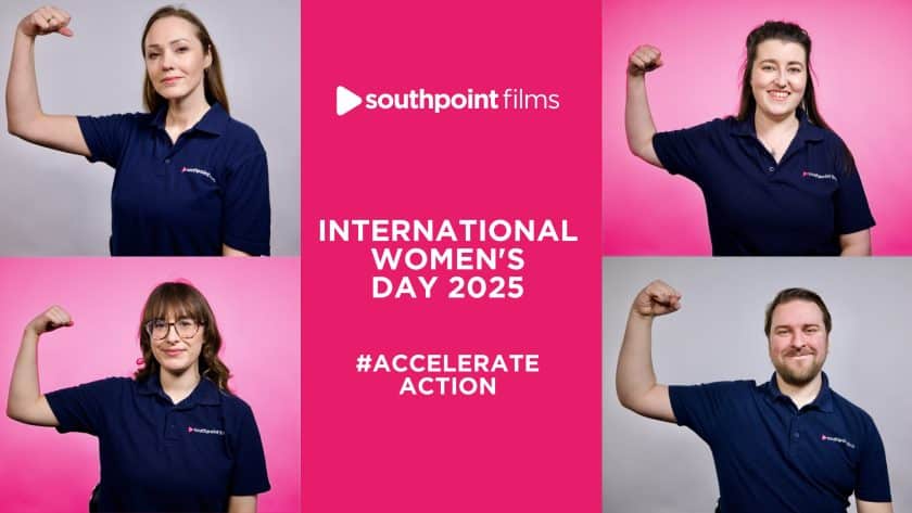 A promotional graphic for International Women’s Day 2025 features four individuals wearing navy-blue "Southpoint Films" polo shirts, flexing their arms in a show of strength. The background alternates between pink and gray. The center of the image has a bold pink panel with white text reading: "Southpoint Films INTERNATIONAL WOMEN’S DAY 2025 #ACCELERATE ACTION" They are smiling, conveying empowerment and solidarity.